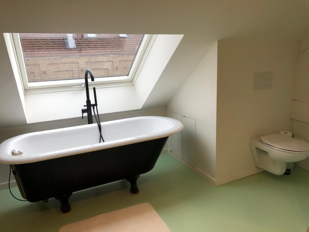 Lichtrijke Loft Bij Restaurant Den Olifant Apartment Ieper Bagian luar foto